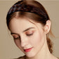 Fascia per capelli con parrucca