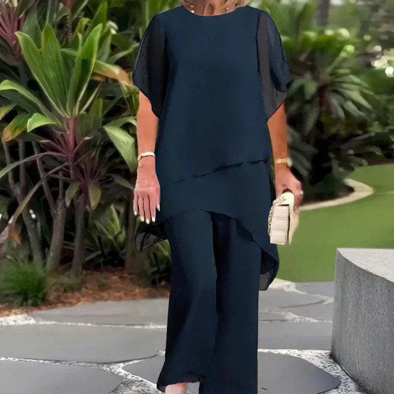 ✨SCONTO DEL 50% – Grazioso set di top irregolari 👗 Elegante set di pantaloni a gamba larga – Comodo e perfetto per la primavera