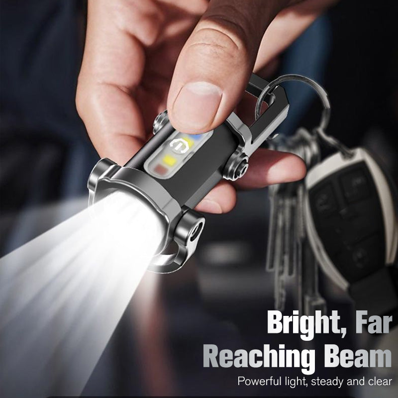 🥳2026 BESTSELLER✨OLTRE 50.000 VENDUTI! 🔦 Torcia portachiavi LED+COB con 7 modalità luminose. Ultra leggera, solo 29g, da agganciare a chiavi o giacca. Pratica per passeggiate, emergenze, riparazioni. Compatta e resistente, non rimarrai mai al buio.
