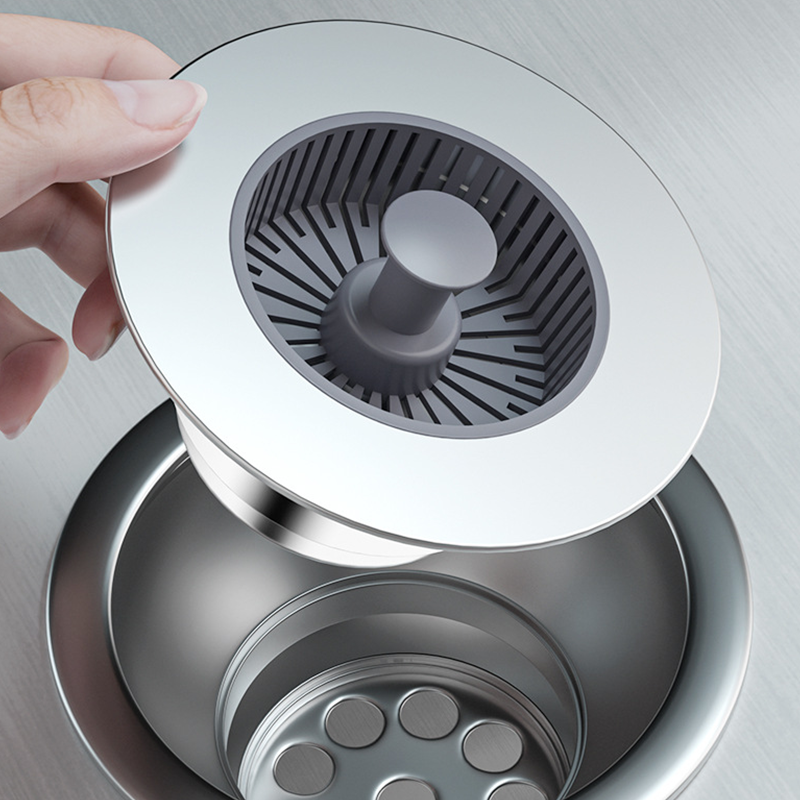 Tappo di scarico per lavello a scomparsa con filtro