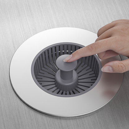 Tappo di scarico per lavello a scomparsa con filtro