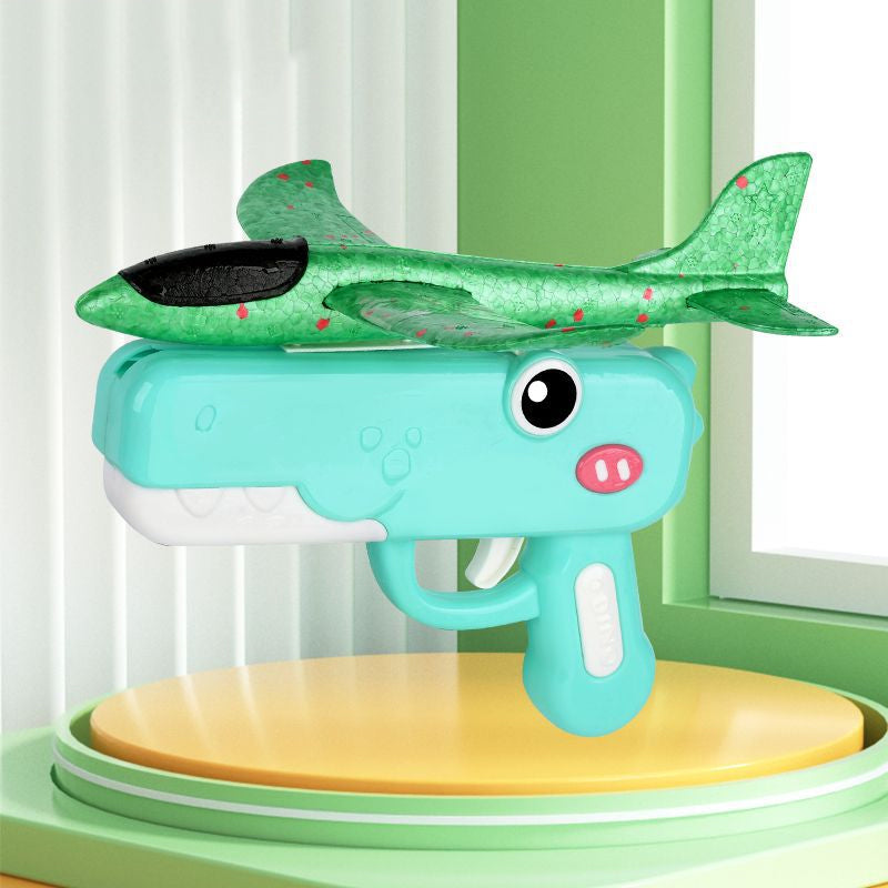 Giocattolo lanciatore di aeroplani a forma di dinosauro per bambini
