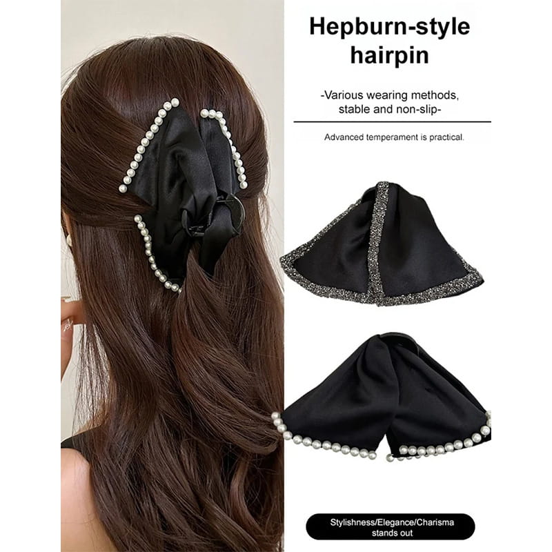 Elegante fermaglio a artiglio per capelli con grande fiocco