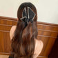 Elegante fermaglio a artiglio per capelli con grande fiocco