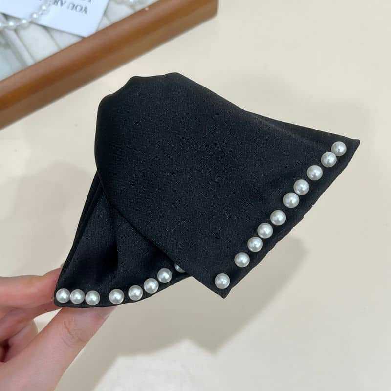 Elegante fermaglio a artiglio per capelli con grande fiocco
