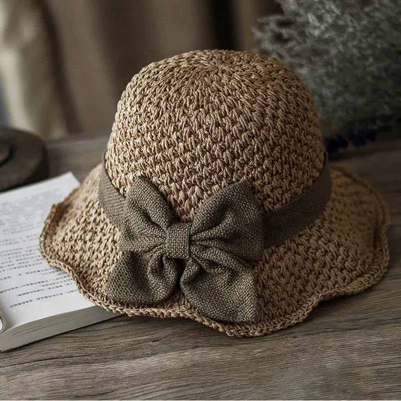 Elegante cappello da sole in paglia intrecciata con fiocco