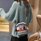 Borsa a tracolla bohemien con nappine ricamate
