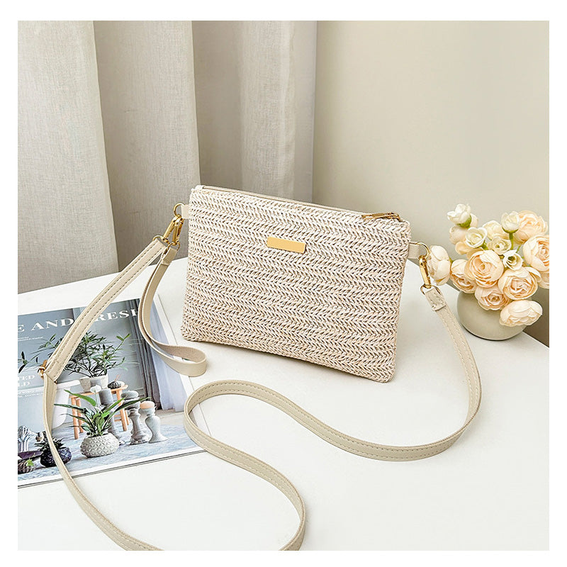 Borsa a tracolla e pochette da donna in paglia intrecciata