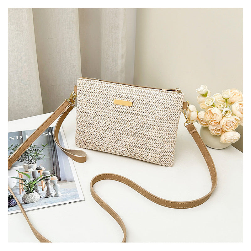 Borsa a tracolla e pochette da donna in paglia intrecciata