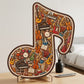 Puzzle in legno con note musicali