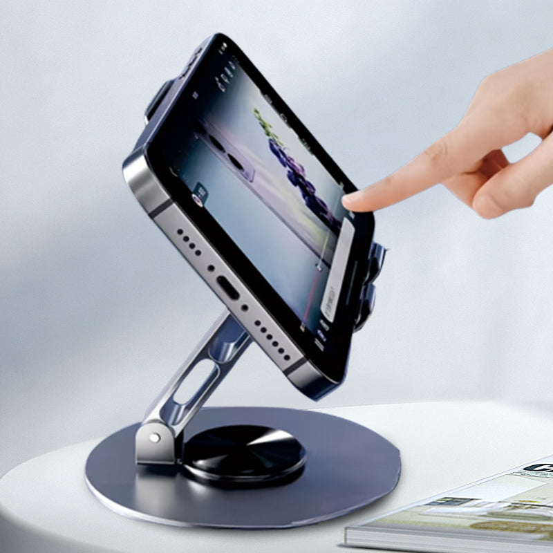 🥳2026 BESTSELLER✨Supporto pieghevole in metallo con rotazione 360° per telefono e tablet. Angolo liberamente regolabile, struttura robusta e antiscivolo. Compatto e portatile, ideale per guardare video, riunioni e navigazione ovunque!📱💻