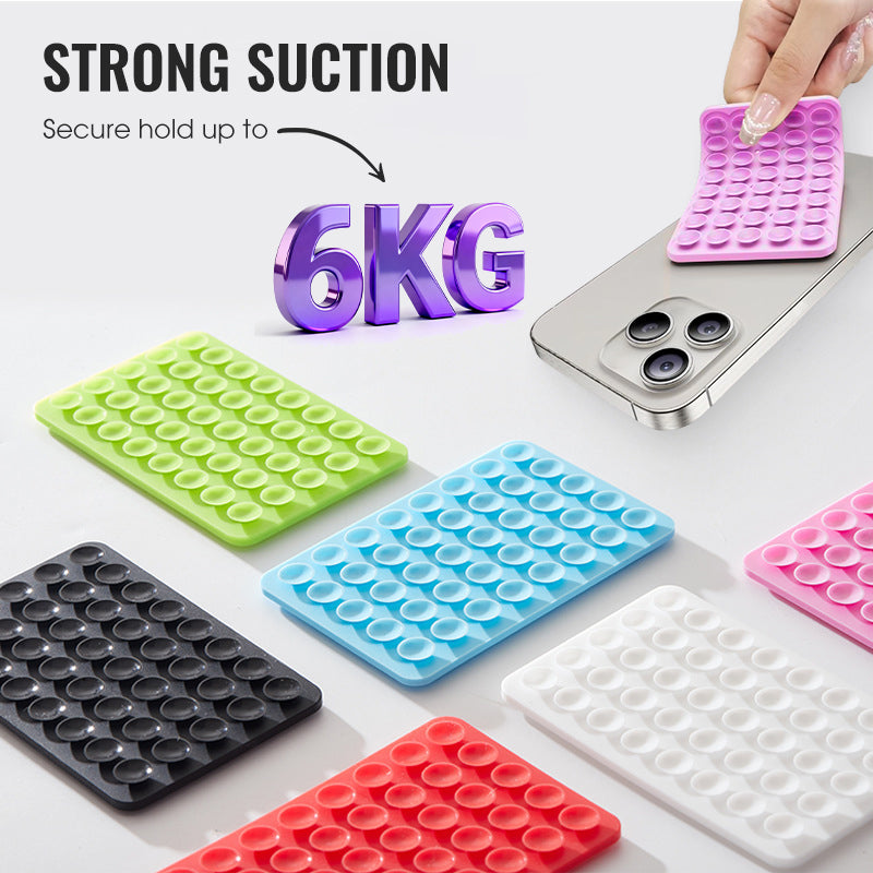 📱✨ Ventosa bifacciale in silicone per telefono – Dì Addio ai supporti instabili e ai residui appiccicosi! 🚫 Aderenza ultraforte, riutilizzabile, senza residui, multiuso per casa e viaggio 🧴 ✨