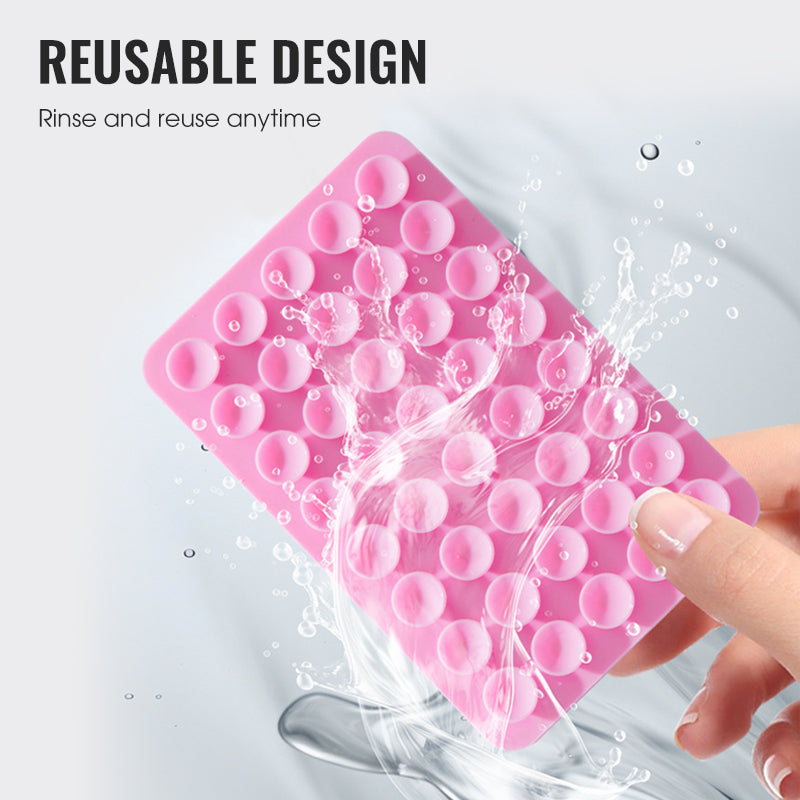 📱✨ Ventosa bifacciale in silicone per telefono – Dì Addio ai supporti instabili e ai residui appiccicosi! 🚫 Aderenza ultraforte, riutilizzabile, senza residui, multiuso per casa e viaggio 🧴 ✨